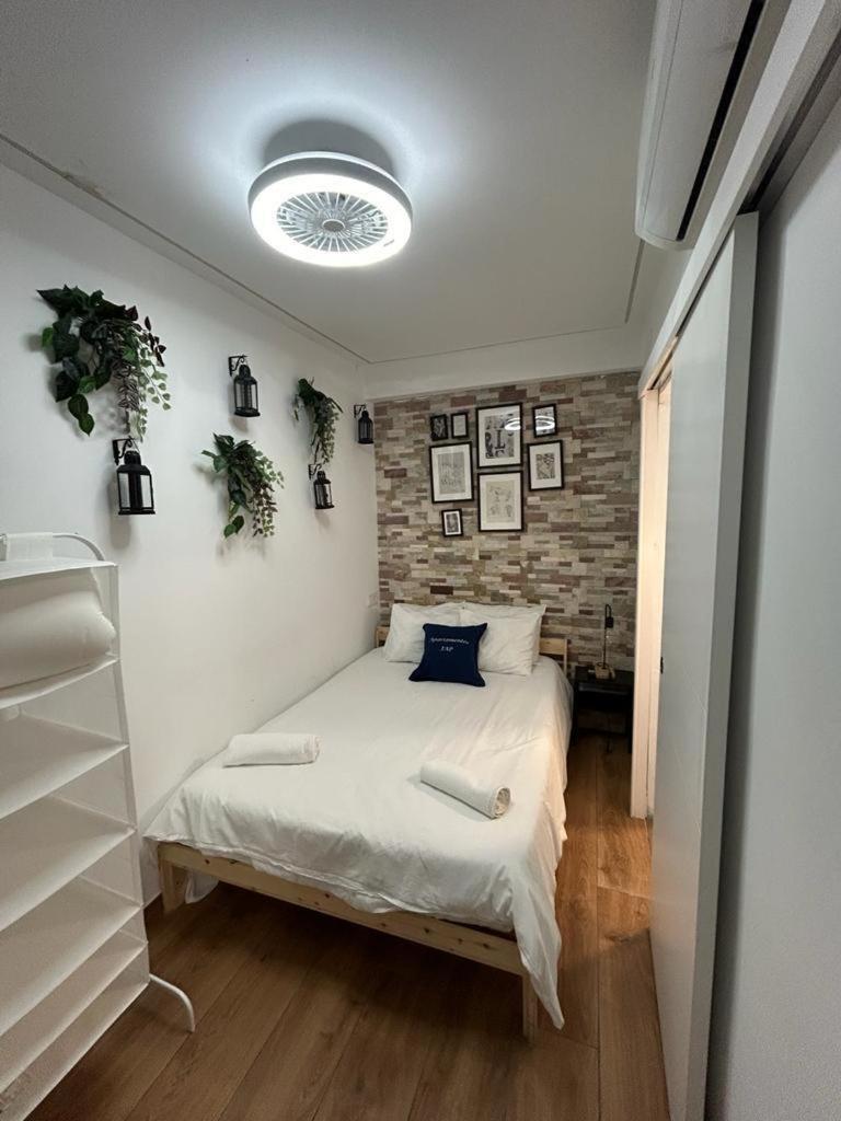 Apartamentos Palma Бенидорм Стая снимка